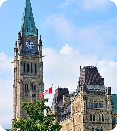Parliament Hill with Canadian flag in Ottawa