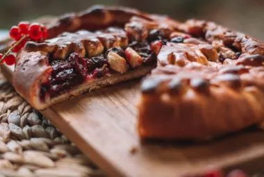 Berry pie on cutting board