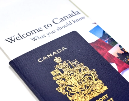 Canadian passport on welcome booklet